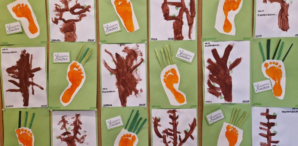Verena Eder Ein Foto der Pinnwand mit den Bildern der Kinder. Es ist der Fastenbaum und die Fußabdruck-Karotte zu sehen.